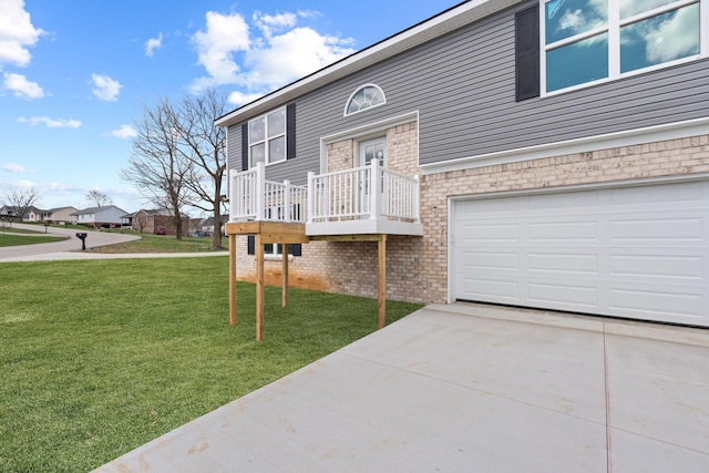 1000 Indian Trl, Lawrenceburg, KY 40342 - split foyer home with concrete driveway, an attached garage, and a front yard