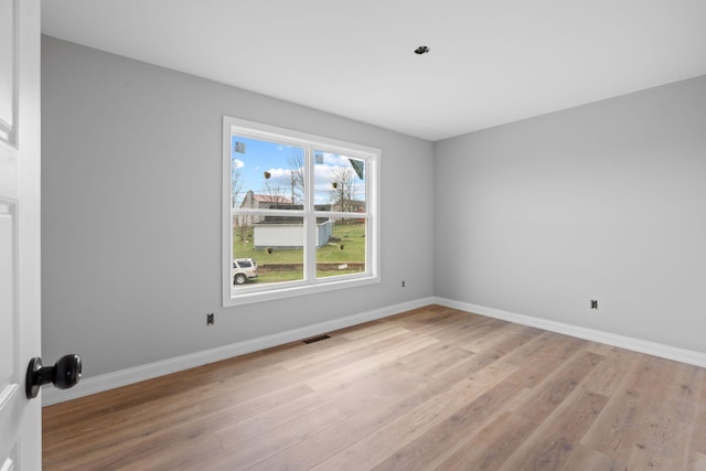 1000 Indian Trl, Lawrenceburg, KY 40342 - spare room with visible vents, baseboards, and light wood finished floors