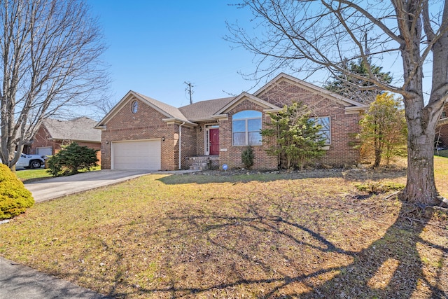 ranch-style house with a front lawn, brick siding, concrete driveway, and an attached garage