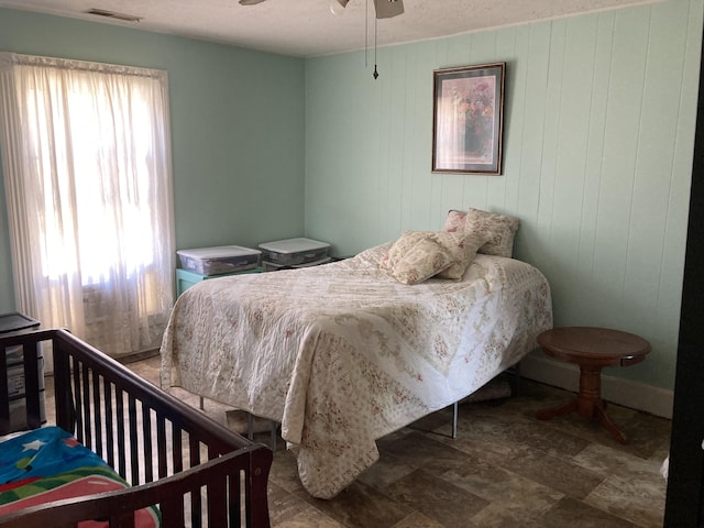 bedroom featuring visible vents