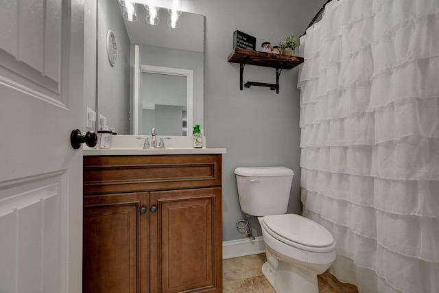 full bath featuring toilet, a shower with shower curtain, tile patterned flooring, baseboards, and vanity