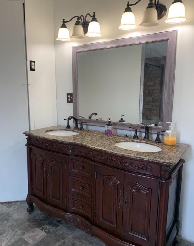 full bath featuring double vanity and a sink