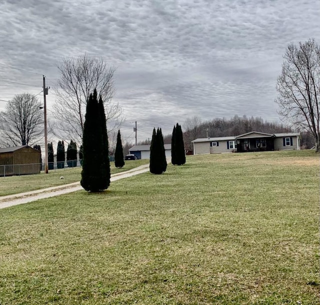 view of yard featuring fence