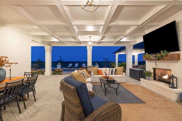 view of patio / terrace featuring an outdoor living space with a fireplace and outdoor dining area