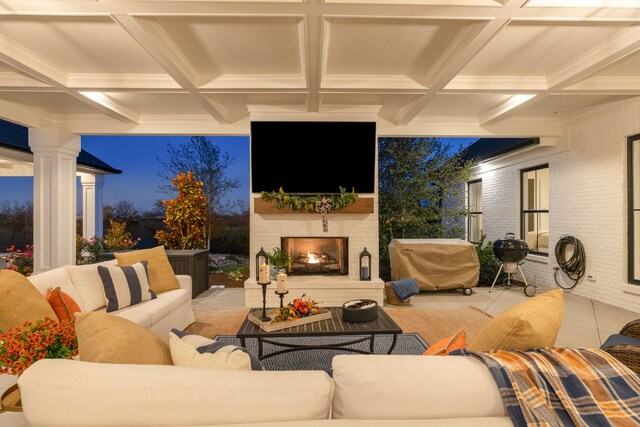 view of patio / terrace featuring an outdoor living space with a fireplace