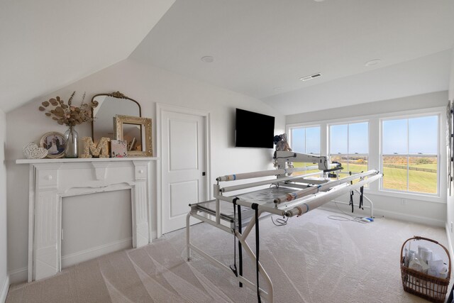 rec room with visible vents, baseboards, vaulted ceiling, and carpet flooring