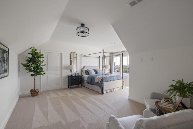 bedroom featuring light carpet, baseboards, visible vents, and vaulted ceiling