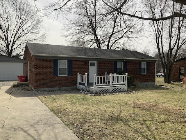 ranch-style home featuring brick siding, crawl space, an outdoor structure, and a front lawn