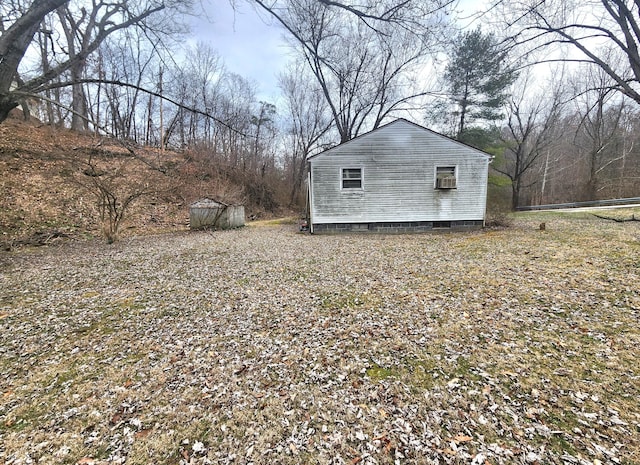 exterior space featuring an outbuilding