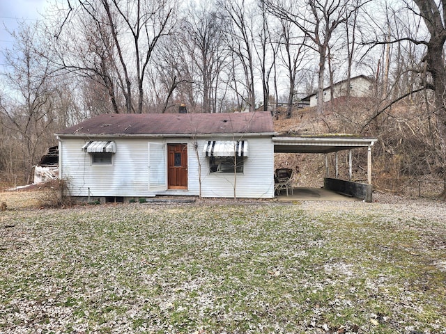 view of front of house featuring an attached carport