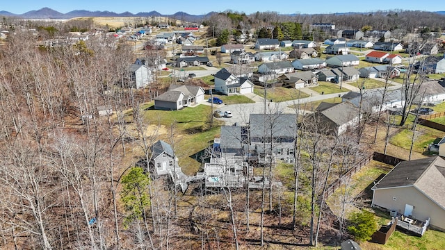 bird's eye view with a residential view and a mountain view