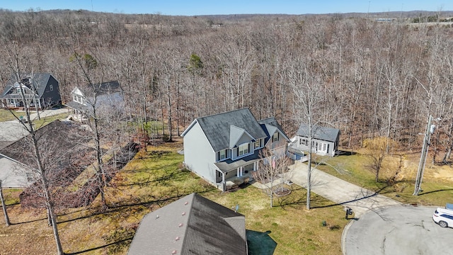 drone / aerial view with a forest view