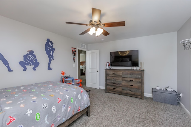 bedroom featuring a ceiling fan, carpet flooring, visible vents, and baseboards