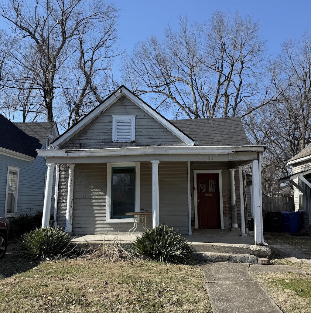 bungalow-style home with a porch