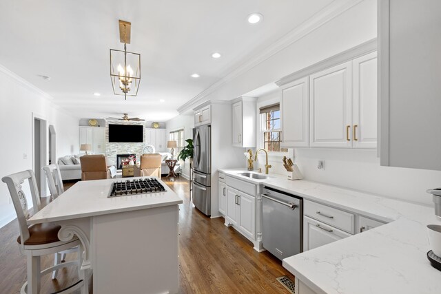 1775 Irvine Rd, Winchester, KY 40391 - kitchen with stainless steel double oven, white cabinetry, light wood-style flooring, light countertops, and recessed lighting