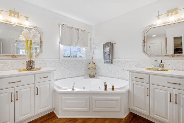 1775 Irvine Rd, Winchester, KY 40391 - bathroom with a marble finish shower, wood finished floors, a bath, and vanity