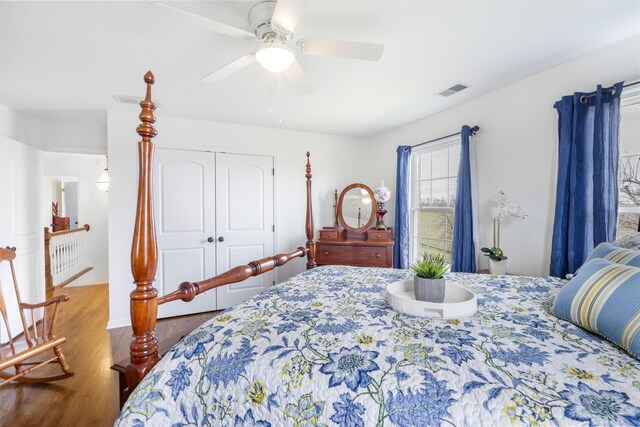 1775 Irvine Rd, Winchester, KY 40391 - bedroom with wood finished floors, a closet, a ceiling fan, and baseboards