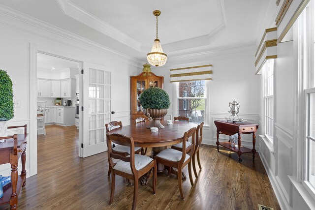 1775 Irvine Rd, Winchester, KY 40391 - living area featuring stairs, a chandelier, wood finished floors, arched walkways, and ornamental molding