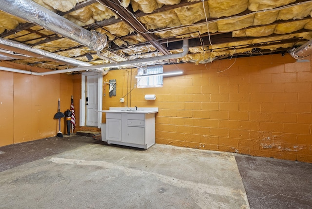 basement with a sink