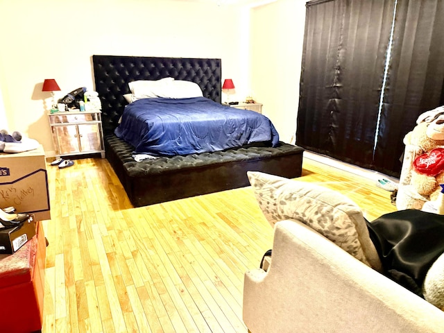 bedroom featuring hardwood / wood-style flooring