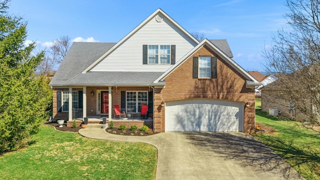 view of front of property with a front lawn, a porch, concrete driveway, a shingled roof, and brick siding