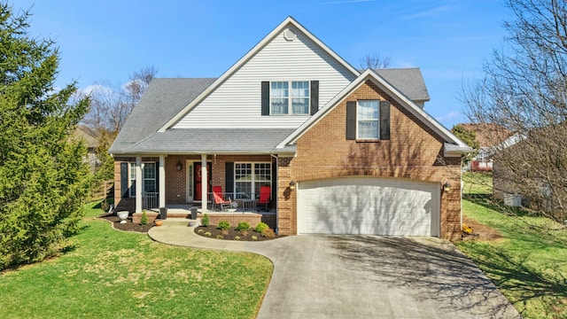 view of front facade with a front lawn, driveway, covered porch, an attached garage, and brick siding