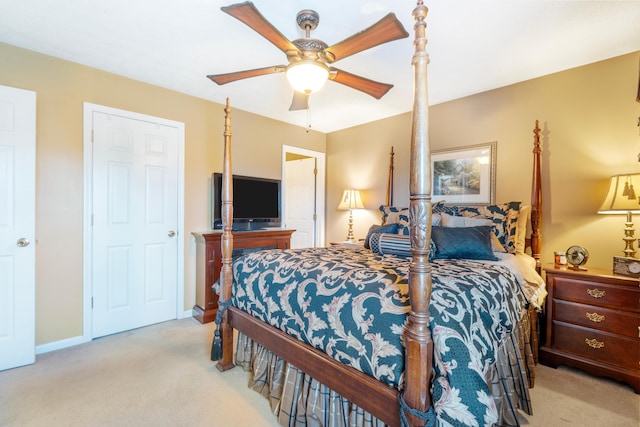 bedroom featuring ceiling fan, baseboards, and carpet flooring