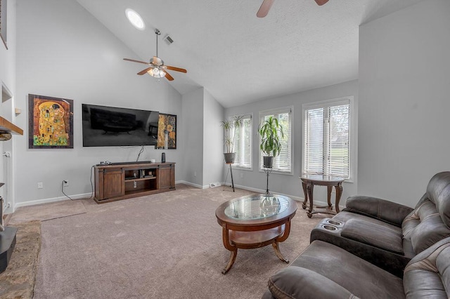 carpeted living area featuring a ceiling fan, visible vents, baseboards, high vaulted ceiling, and a textured ceiling