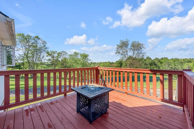 deck with an outdoor fire pit