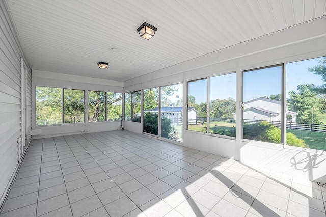 view of unfurnished sunroom