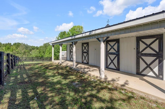 view of outbuilding featuring an outbuilding and an exterior structure