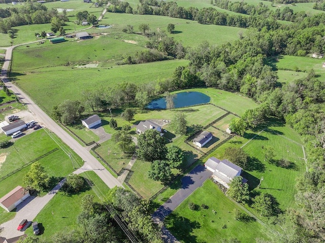 drone / aerial view with a rural view and a water view