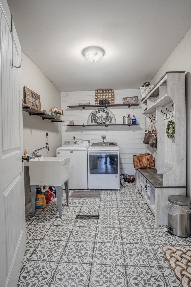 1204 Meadow Brook Dr, Lawrenceburg, KY 40342 - laundry room with washer and dryer, laundry area, wooden walls, and a sink
