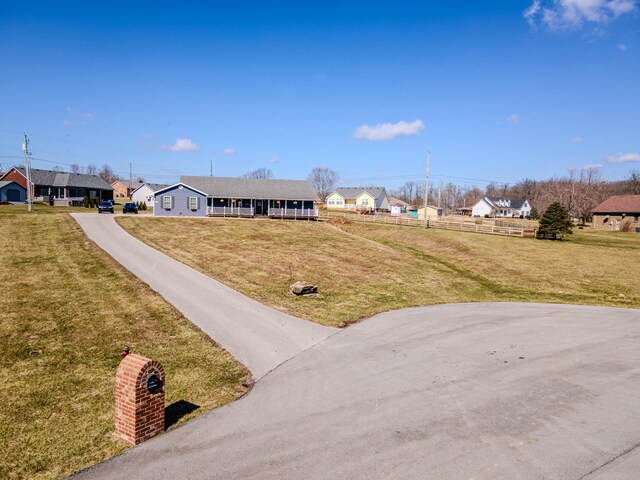 1204 Meadow Brook Dr, Lawrenceburg, KY 40342 - view of yard featuring a residential view and fence