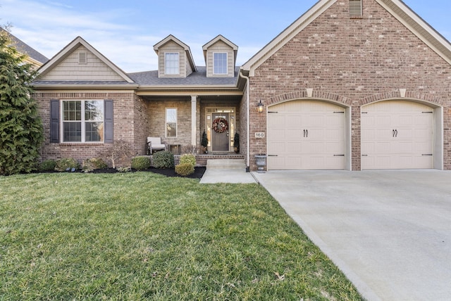 view of front of home featuring a front yard, an attached garage, brick siding, and driveway