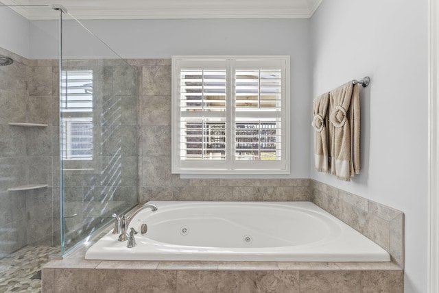 full bathroom featuring a whirlpool tub, tiled shower, and ornamental molding