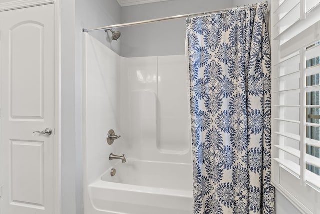 full bathroom with shower / bath combination with curtain