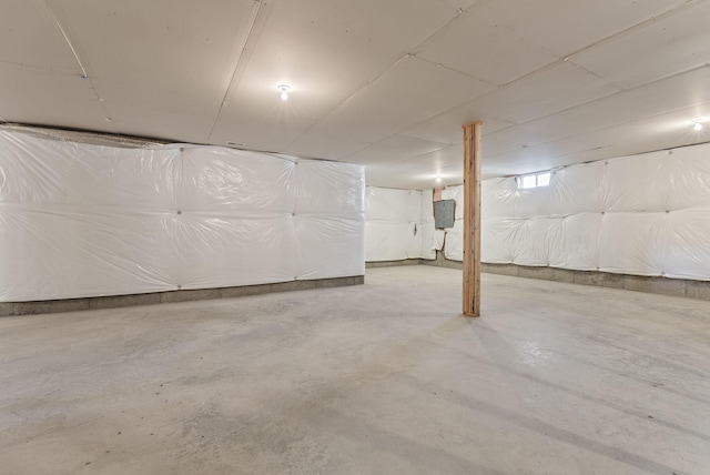 unfinished basement with electric panel