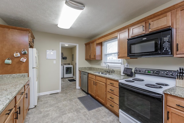 kitchen featuring electric stove, a sink, washer / clothes dryer, stainless steel dishwasher, and black microwave