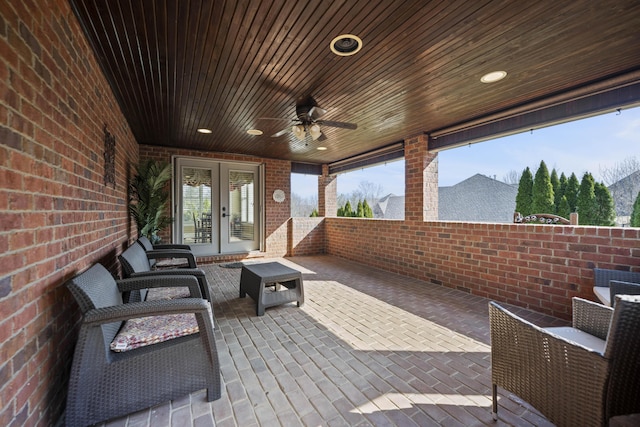 view of patio / terrace with french doors and a ceiling fan