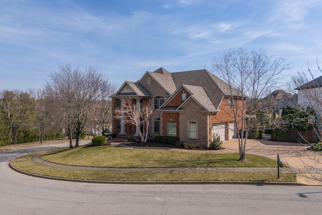 view of front facade featuring an attached garage, a shingled roof, concrete driveway, a front lawn, and brick siding