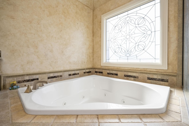 bathroom featuring a whirlpool tub