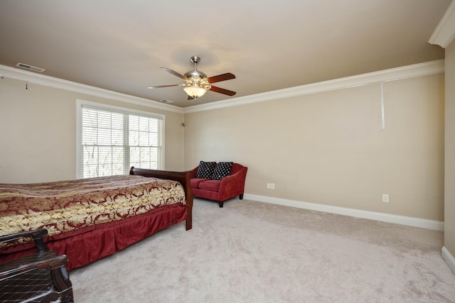 carpeted bedroom featuring visible vents, a ceiling fan, baseboards, and ornamental molding