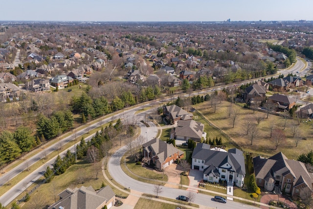 birds eye view of property with a residential view