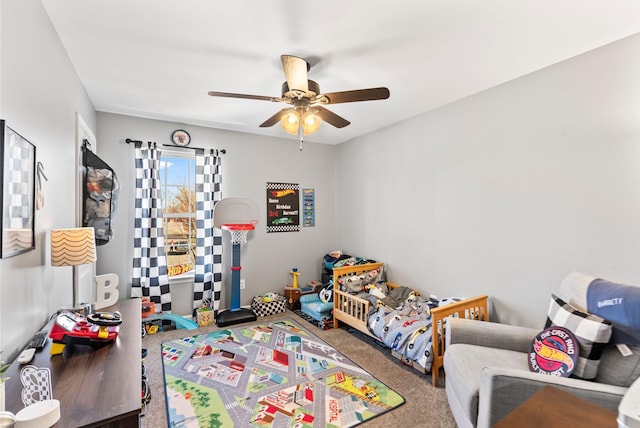 carpeted bedroom featuring a ceiling fan