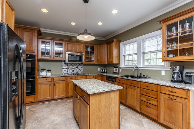 kitchen with a sink, black appliances, brown cabinets, ornamental molding, and recessed lighting