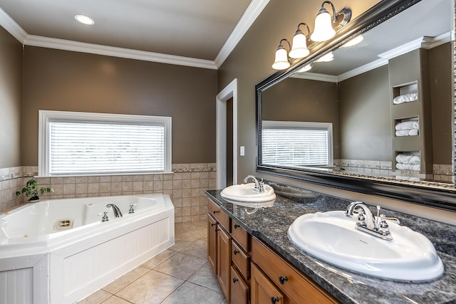 full bathroom with tile walls, tile patterned floors, a jetted tub, and a sink