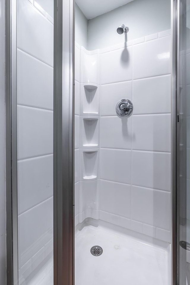 bathroom featuring a stall shower