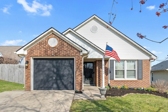 view of front of property with brick siding, concrete driveway, a garage, and fence