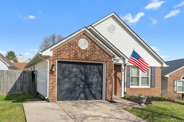 view of front facade with brick siding, an attached garage, driveway, and fence